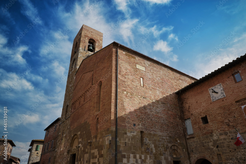 side view of the church of santa maria assunta in the medieval town of casole d'elsa in tuscany