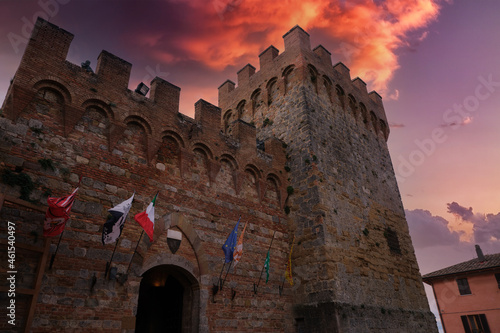 front view of the castle of the medieval town of casole d'elsa in tuscany at sunset photo