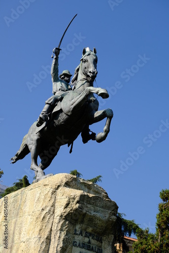 Giuseppe Garibaldi. Equestrian statue of Giuseppe Garibaldi.Garibaldi on a rampant horse, bronze monument in the public gardens. Made by Antonio Garella. 