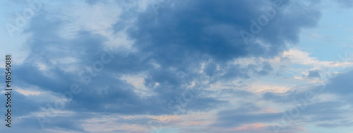 Fototapeta Naklejka Na Ścianę i Meble -  The blue sky covered with dark clouds in the evening