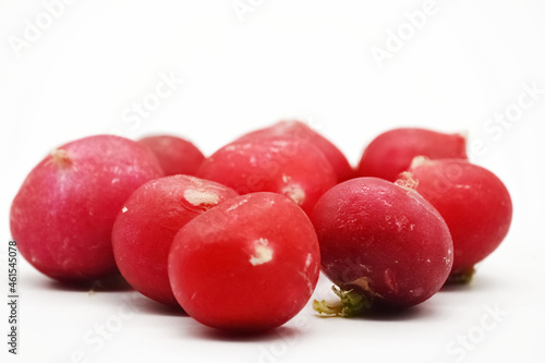 Closeup shot of fresh red beats isolated on a white background photo