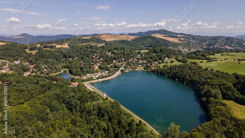 Fototapeta Naklejka Na Ścianę i Meble -  Aerial view of Vindsachtske lake in the village of Stiavnicke Bane in Slovakia