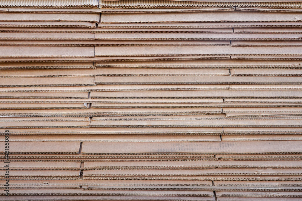 Close-up photo of brown cardboard sheets from under the boxes Close-up photo of brown cardboard sheets from under the boxes