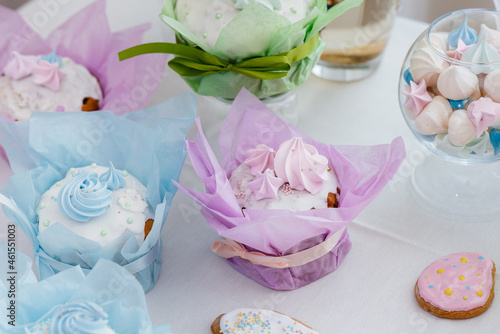 Beautiful Easter cakes on a decorated light table. A light holiday of Easter.