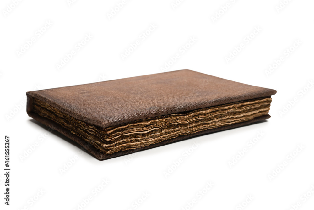 An old brown book isolated on white background. An old brown book isolated on white background.