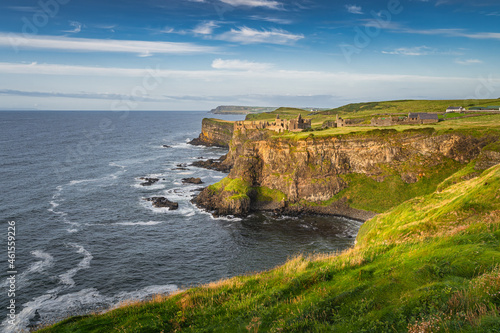 Εκτύπωση καμβά Spectacular coastline, Dunluce Castle located on edge of the cliff, Bushmills, Northern Ireland