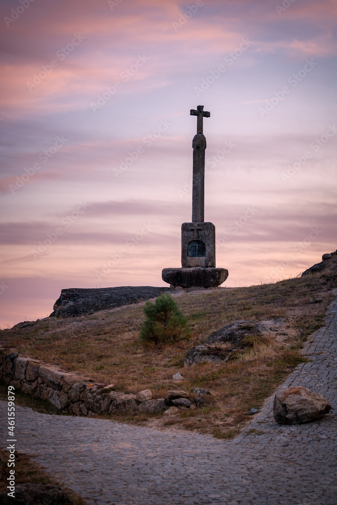 Cross monument at sunset in Xertelo in Geres National Park, in Portugal
