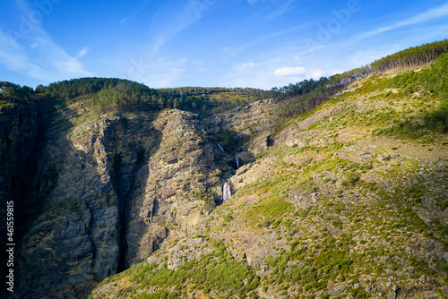 Fototapeta Naklejka Na Ścianę i Meble -  Fisgas de ermelo waterfall drone aerial view in Mondim de Basto