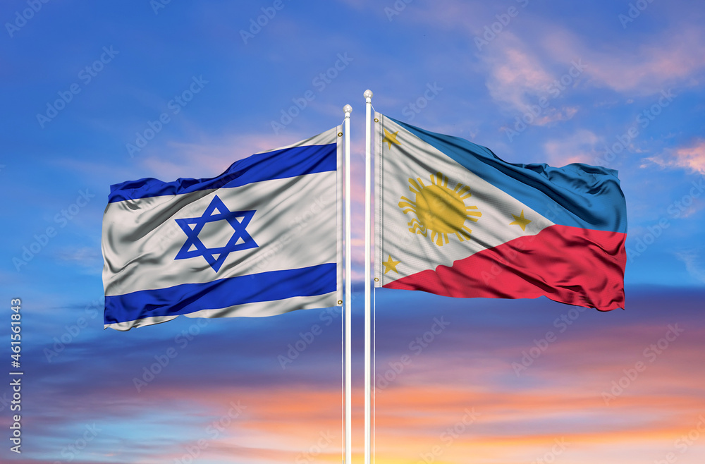 Philippines and Israel flag waving in the wind against white cloudy blue sky together. Diplomacy concept, international relations