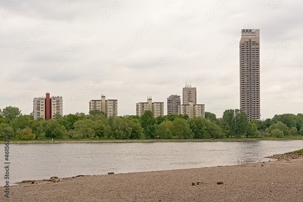Skyscrapers along the borders of river Rhine in Cologne, view from the beach on the other side of the river.
Skyscrapers along the borders of river Rhine in Cologne, view from the beach on the other side of the river.