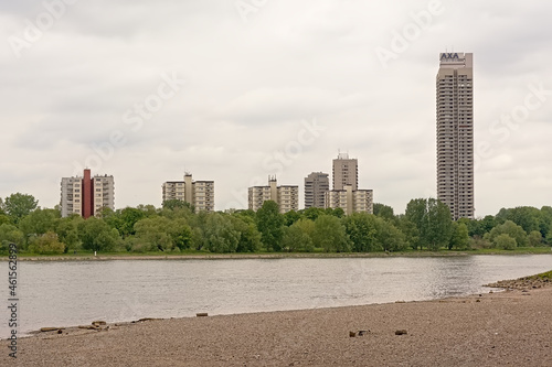 Skyscrapers along the borders of river Rhine in Cologne, view from the beach on the other side of the river.  © Kristof Lauwers