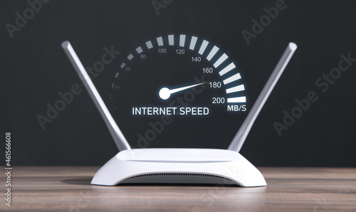 Bild auf Leinwand Modern wifi router with a speedometer. Internet speed