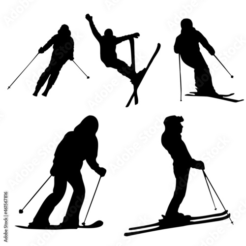 Skiers. Alpine skiing. Five silhouettes of skiers. The shadows of the skiers. A set of silhouettes of skiers. Stencils