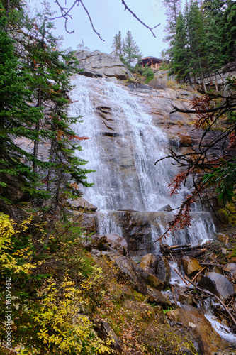 Amazing waterfall flowing in forest in Lake Agnes at Banff national park, Alberta, Canada