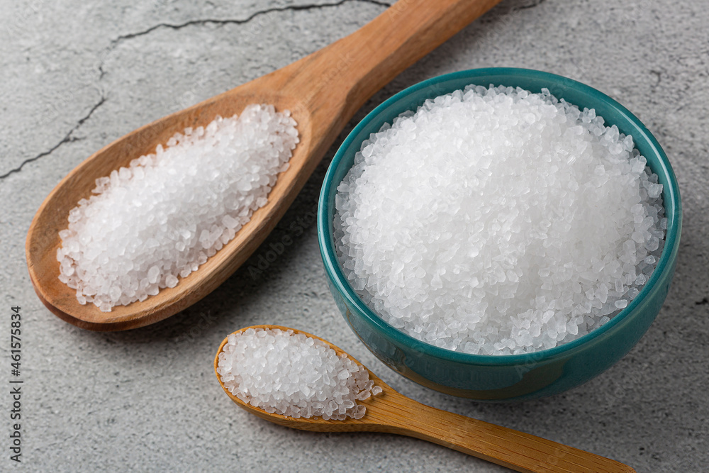Bowl with coarse salt on the table. Bowl with coarse salt on the table.