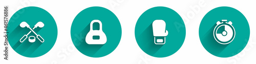 Set Ice hockey sticks and puck, Weight, Boxing glove and Stopwatch icon with long shadow. Vector
