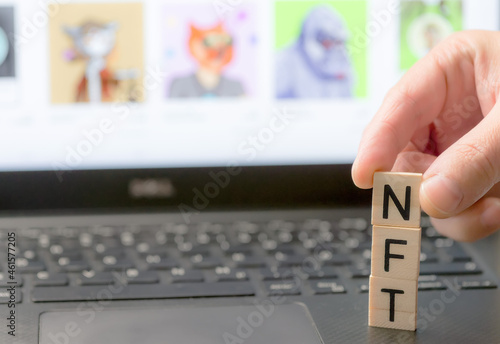 NFT or Non-Fungible token letters and dices, nft‘s are a blockchain market for art and collections