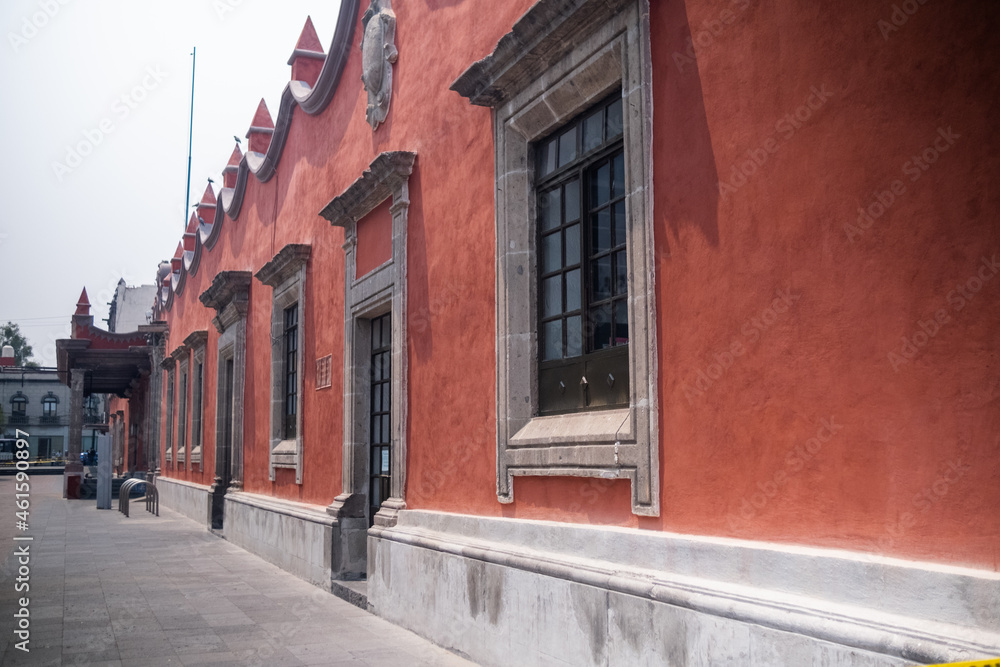 Beautiful classic orange and gray building in Coyoacan, Mexico City