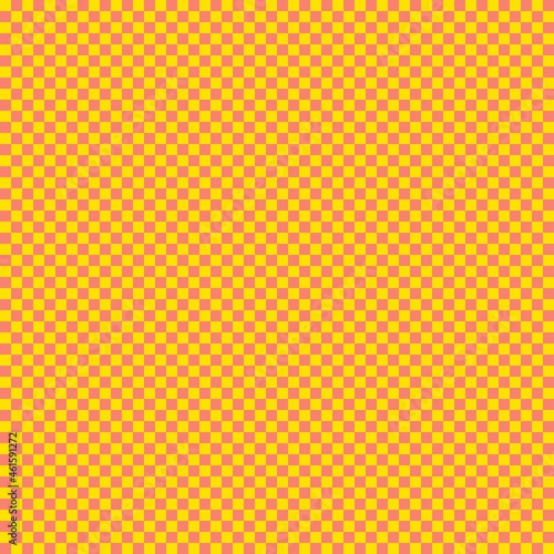 Checkerboard with very small squares. Salmon and Yellow colors of checkerboard. Chessboard, checkerboard texture. Squares pattern. Background.