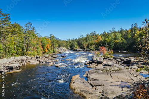 Penobscot River surrounded by early fall foliage in Baxter State Park Maine photo