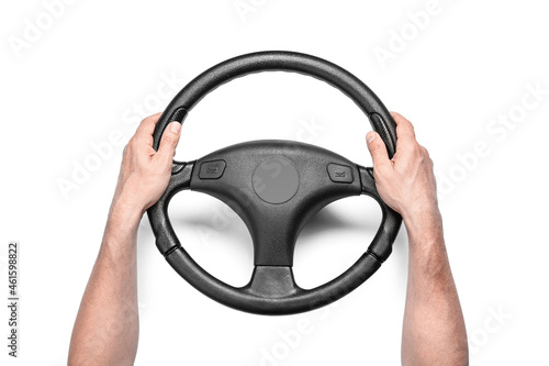 Man holding steering wheel on white background © Pixel-Shot