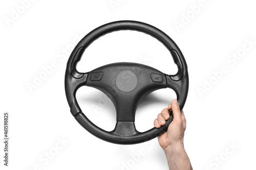 Male hand and steering wheel on white background © Pixel-Shot
