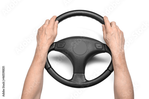 Man holding steering wheel on white background, closeup © Pixel-Shot