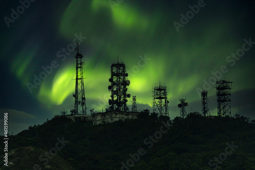 telecommunication tower with telecom broadcasting antenna on mountain