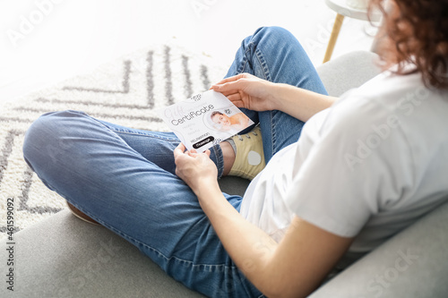 Young woman with gift certi...