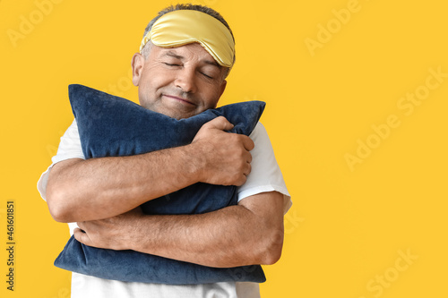 Mature man with sleep mask ...