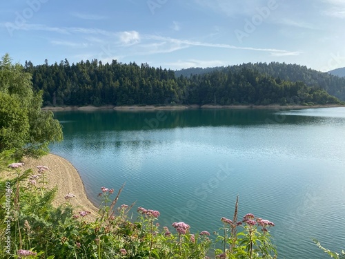 Artificial reservoir Lake Lokve or Artificial accumulation Lokvarsko Lake - Gorski kotar, Croatia (Lokvarsko jezero ili umjetno akumulacijsko Omladinsko jezero, Lokve - Gorski kotar, Hrvatska) photo