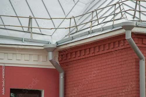 Building roof fencing. Modern metal roof fence for security.