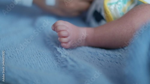 mother wearing sock to baby