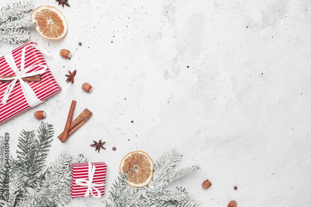 Christmas flat lay top view with red gift boxes, decorations, fir, cinnamon Christmas flat lay top view with red gift boxes, decorations, fir, cinnamon