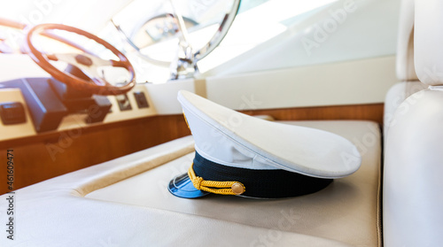 Rudder and captain's hat on yacht © xy