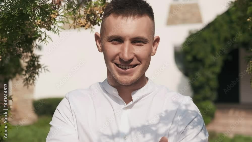 Portrait of a young guy of caucasian appearance. Outdoors. Portrait of a young guy of caucasian appearance. Outdoors.