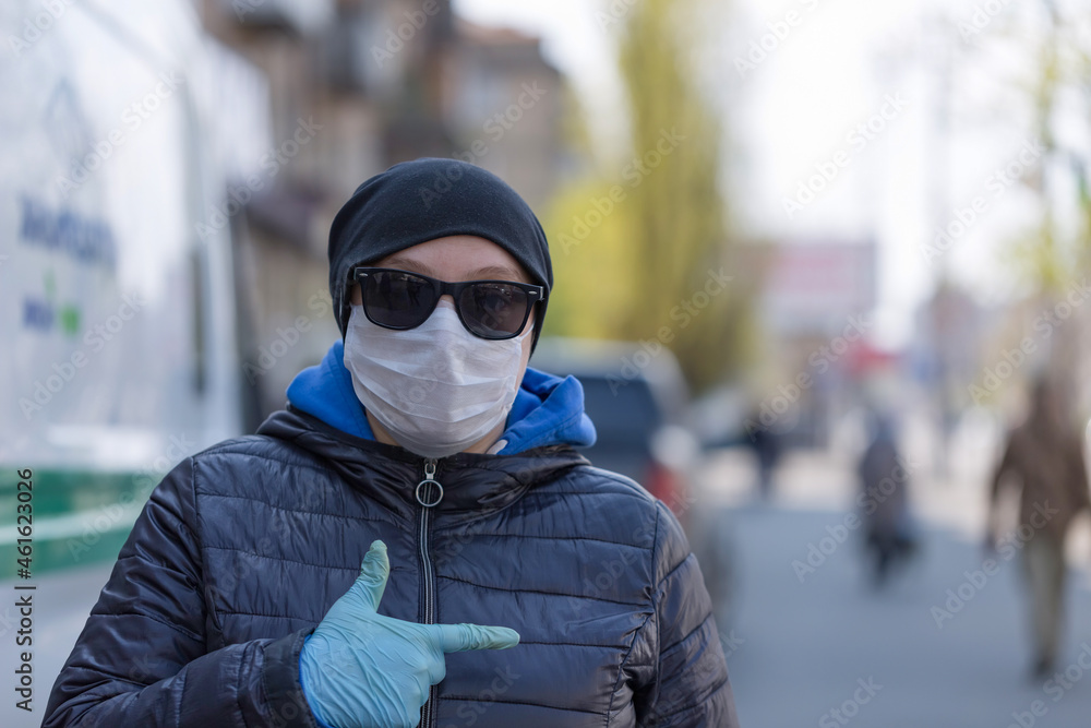 Coronavirus concept Girl wearing in a protective mask Coronavirus concept Girl wearing in a protective mask
