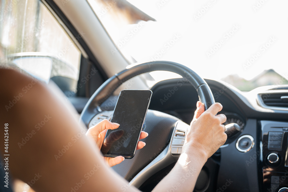 Texting while driving a car
