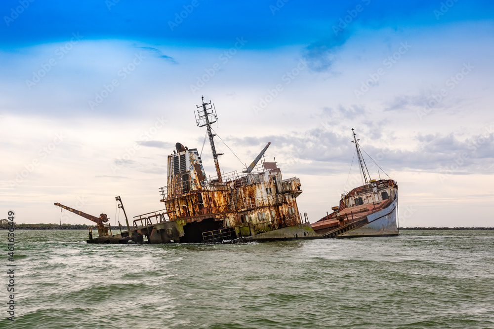Wrecked ship in sea Wrecked ship in sea