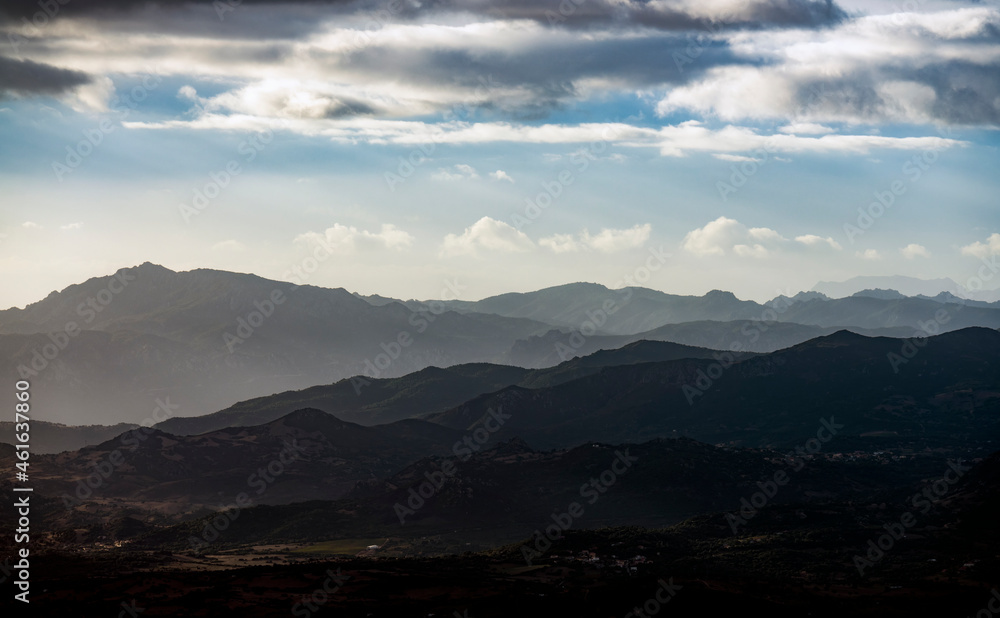 View from above, stunning view of valley surrounded by a mountain range during a beautiful sunrise. Panoramic view from Monte Pino (Vedetta Monte Pino) Sardinia, Italy.