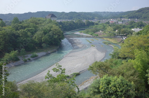 tama river flowing in ome city, tokyo