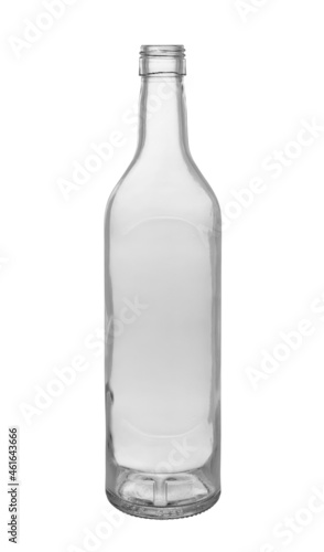 An empty open wine bottle made of transparent glass. On a white background, close-up