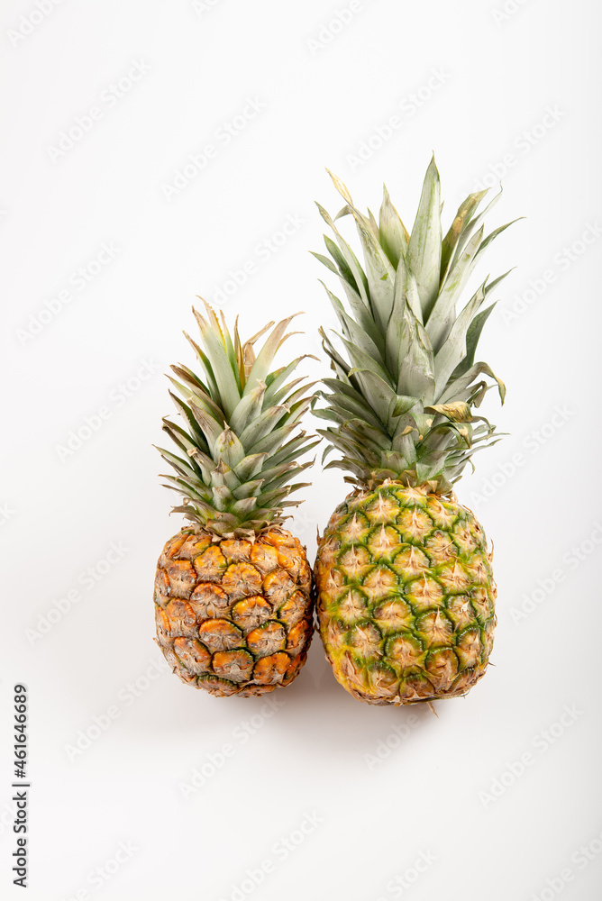 Two beautiful pineapples on white background Two beautiful pineapples on white background