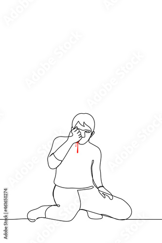 man sits on his knees looking at his clenched fist from which blood flows - one line drawing. an injured kneeling man watches the bleeding from his own hand