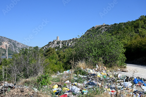 Garbage dumped along the road near historic fortress.