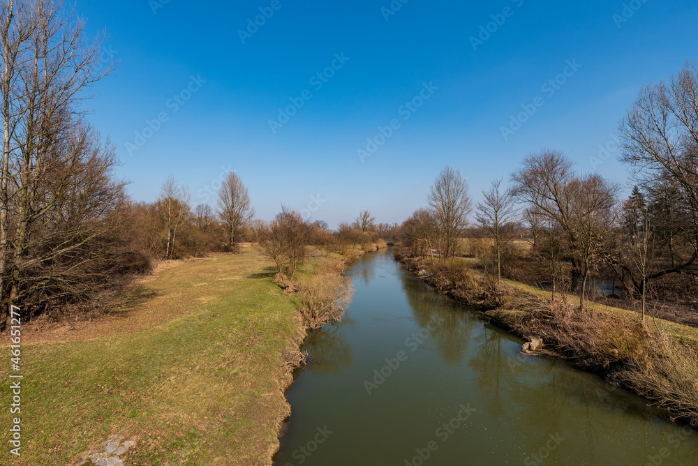Odra river with trees and meadow around in CHKO Poodri in Czech republic
