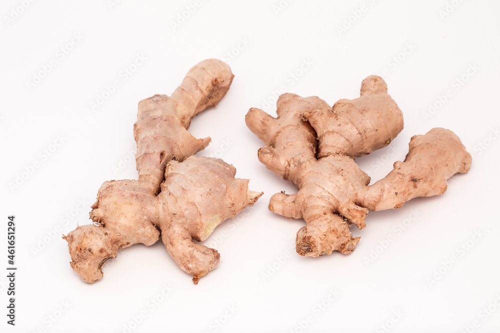 Ginger roots isolated on white background, Indian seasoning spice Ginger roots isolated on white background, Indian seasoning spice