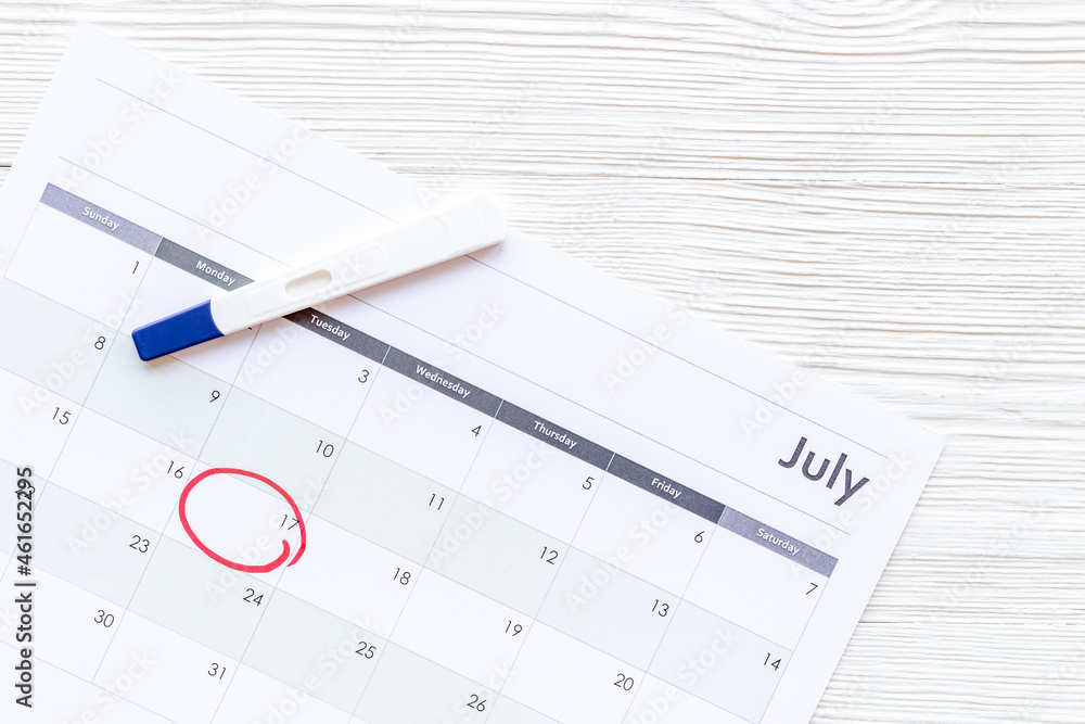 Pregnancy test on calendar. Time to check pregnancy day Pregnancy test on calendar. Time to check pregnancy day