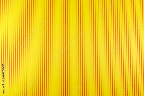 Bright vivid Pantone yellow vertical steady stripes straight lines pattern corrugated cardboard carton design abstract texture background wallpaper, High resolution, colorful