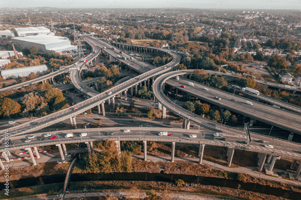 Vehicles Driving on a Spaghetti Junction Interchange in the UK at Sunset